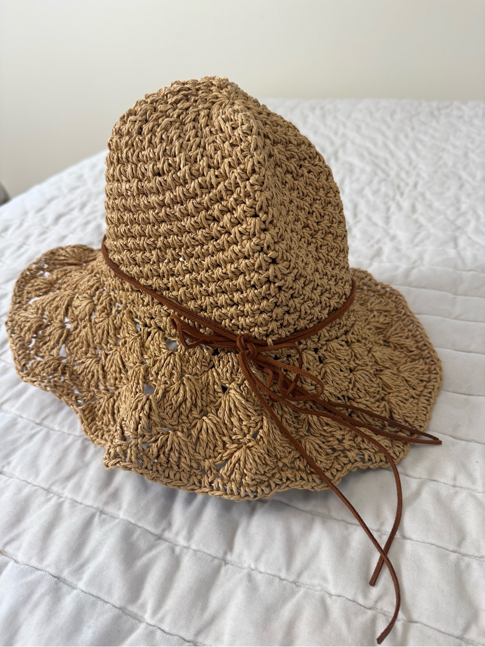 Women’s Sun Hat with Flexible Brim and Bow Accent in a Natural Tan Color